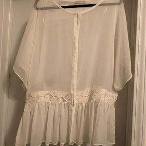 Cream blouse with crochet detail